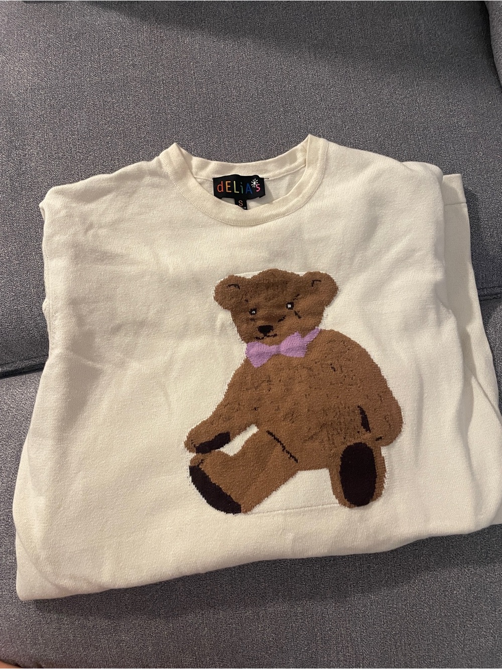 dELiA*s Cream Knit Sweater with Brown Teddy and Lilac Bow - Picture 1 of 4